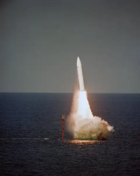 A Polaris missile lifts off after being fired from the submerged British nuclear powered ballistic missile submarine HMS Revenge in 1986.resized