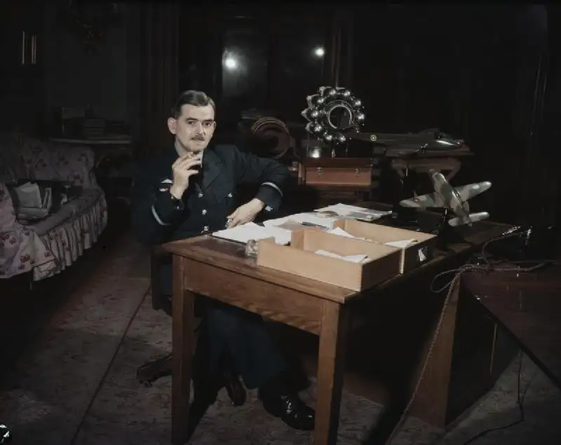 Air Commodore Frank Whittle seated at his desk at during World War II