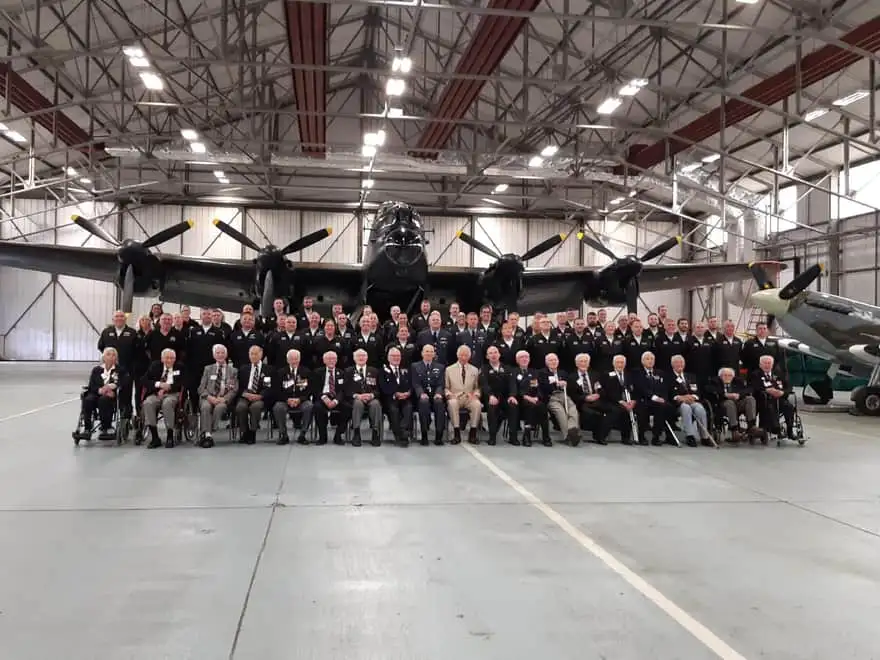 The King joins veterans in front of the Lancaster at the BBMF at RAF Coningsby IMAGE Lincolnshire World
